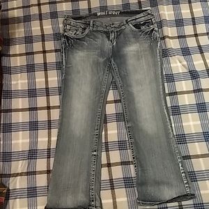 Wallflower stone wash distressed jeans.